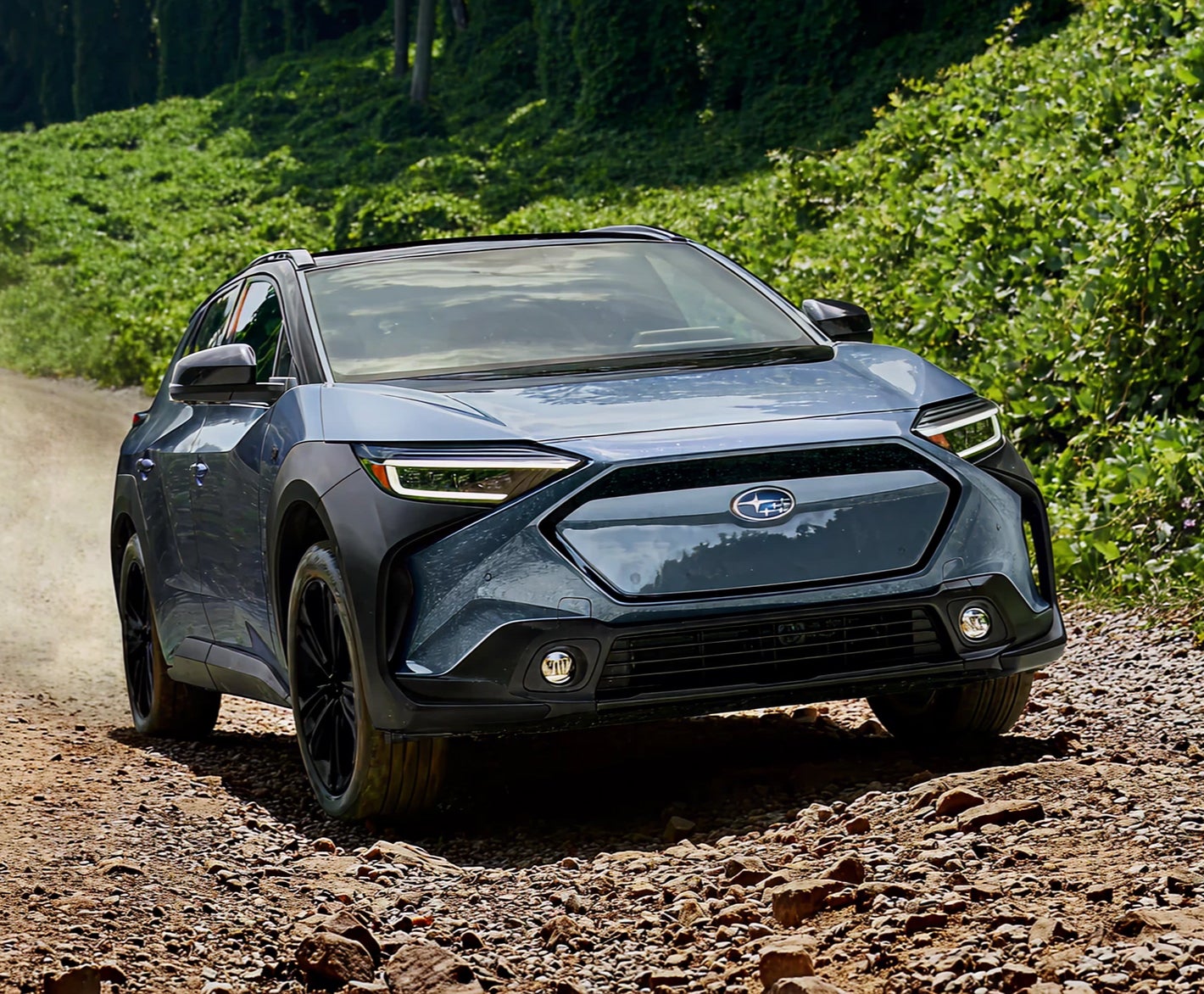 Subaru Solterra SUV on rugged off-road terrain