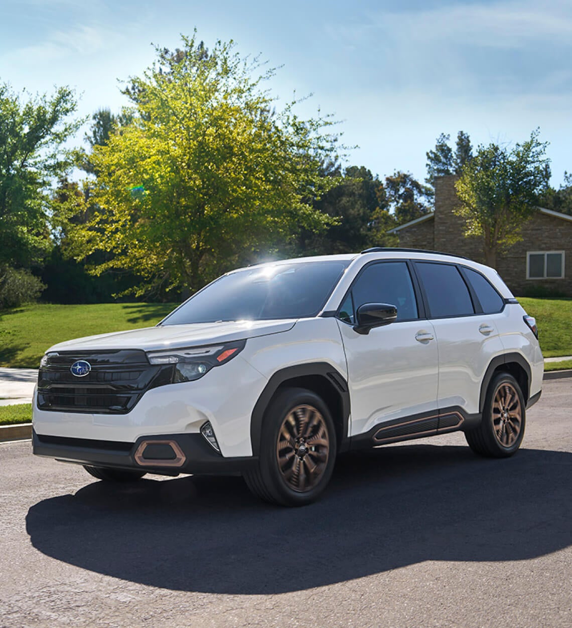 Subaru Ascent Onyx Edition in Crystal White Pearl with bronze wheels.